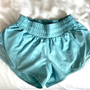 These are Lululemon hotty hot shorts in the icing blue color. They are a size 0!